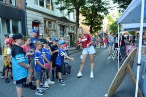 Kids throwing a beanbag