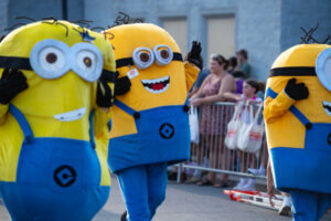 Minions waving to the crowd